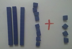 adding with base ten blocks