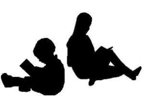 silhouette of children reading books