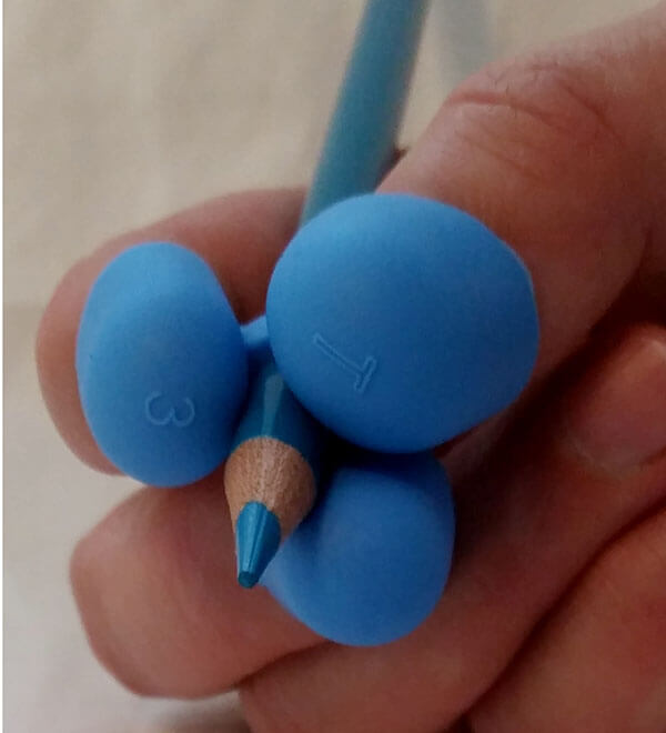 The Claw Pencil Grip