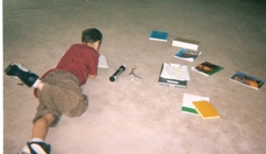 Child studying on floor