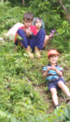 Kids On a Grassy Hill