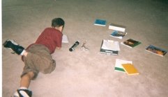 Child studying on floor