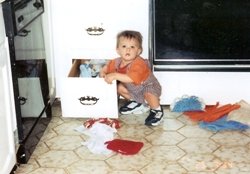 toddler messing up the kitchen